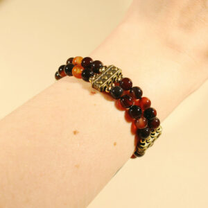 Dubbelt kristallarmband med drömagat och mässingskulor